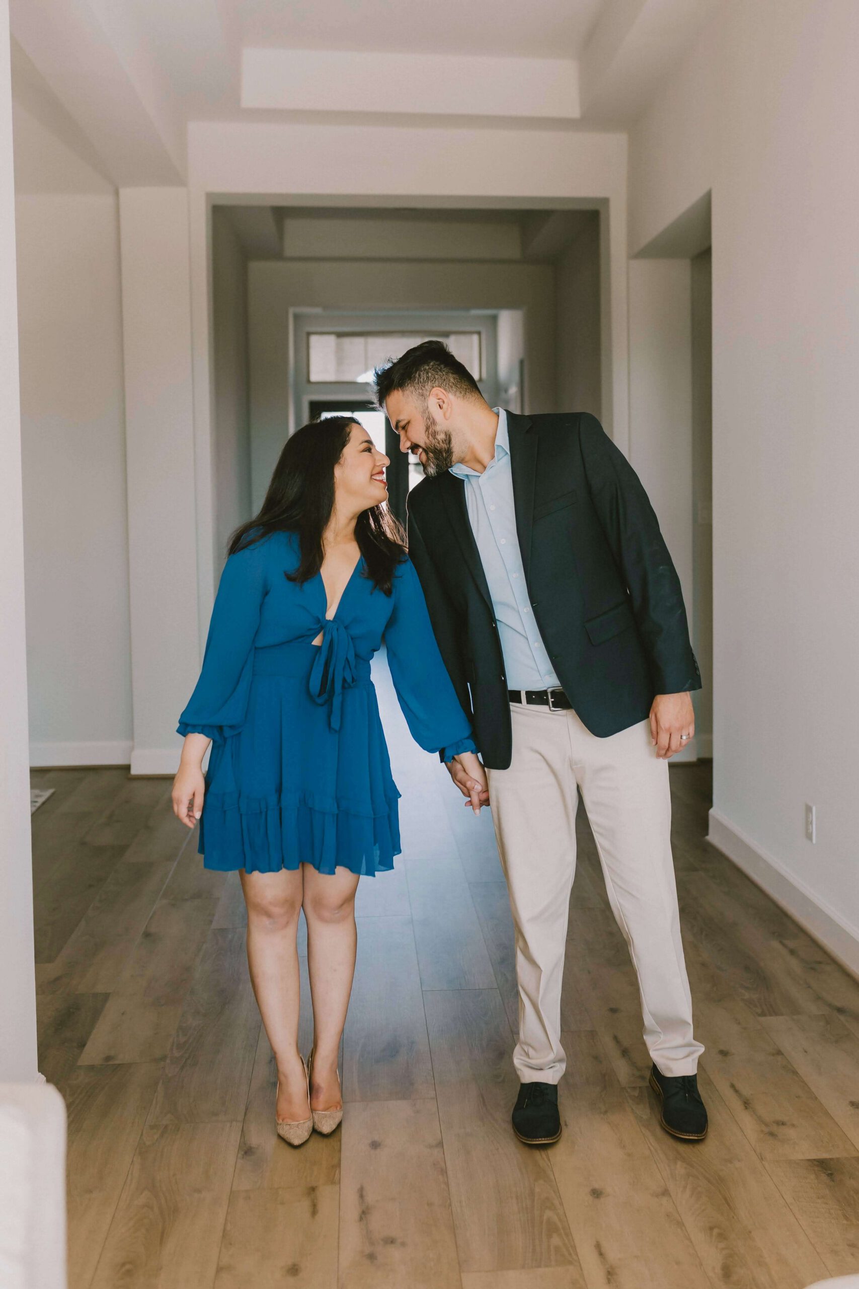 Dr. Vargas and her husband look and smile at each other.