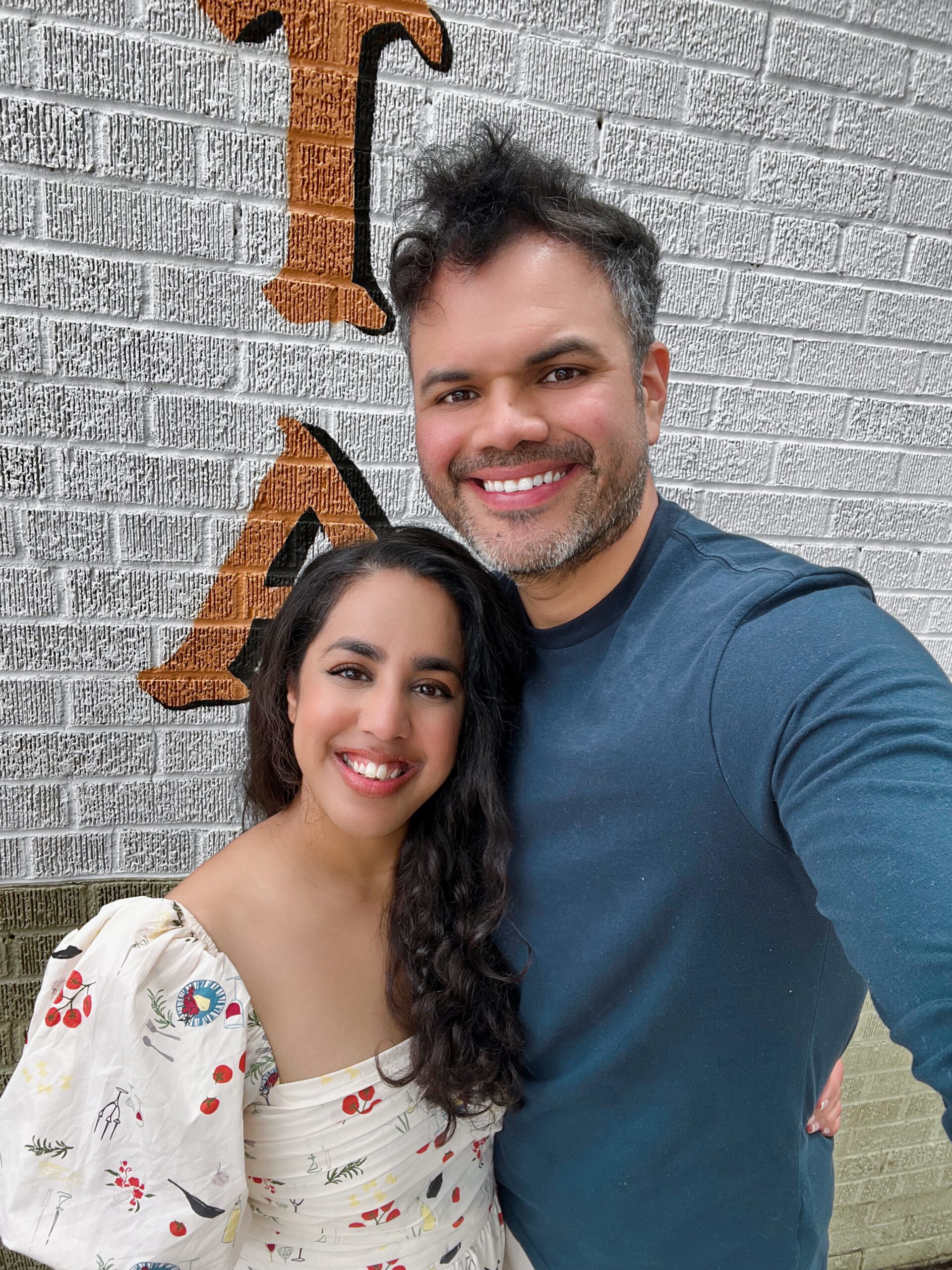 Dr. Vargas smiles with her husband.